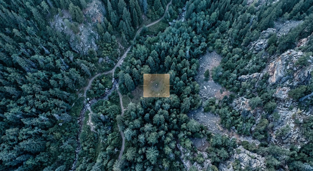 Aerial search view with AI person detection highlight